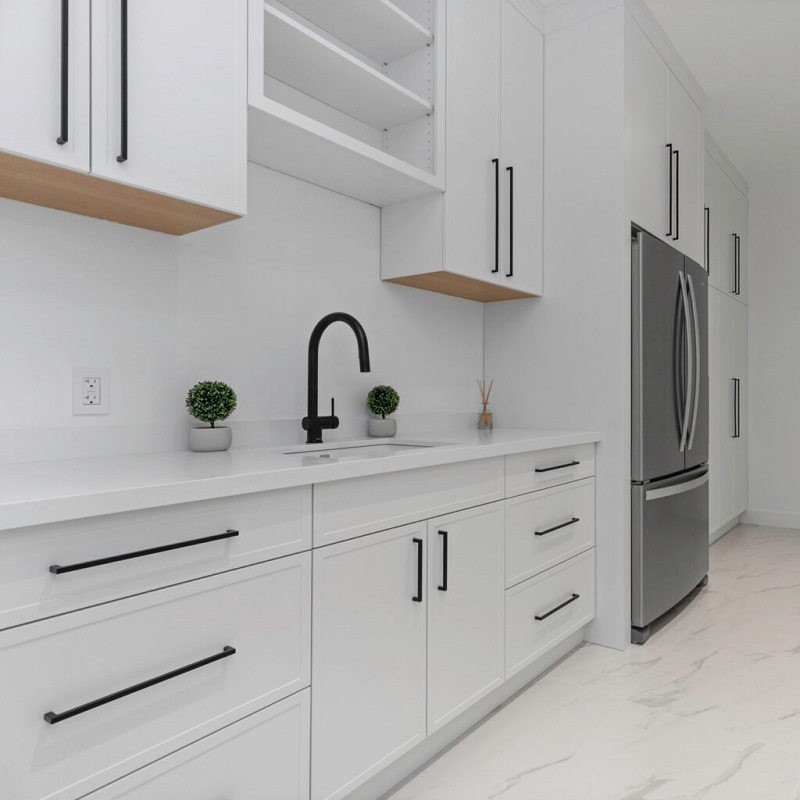 white kitchen cabinets with black hardware